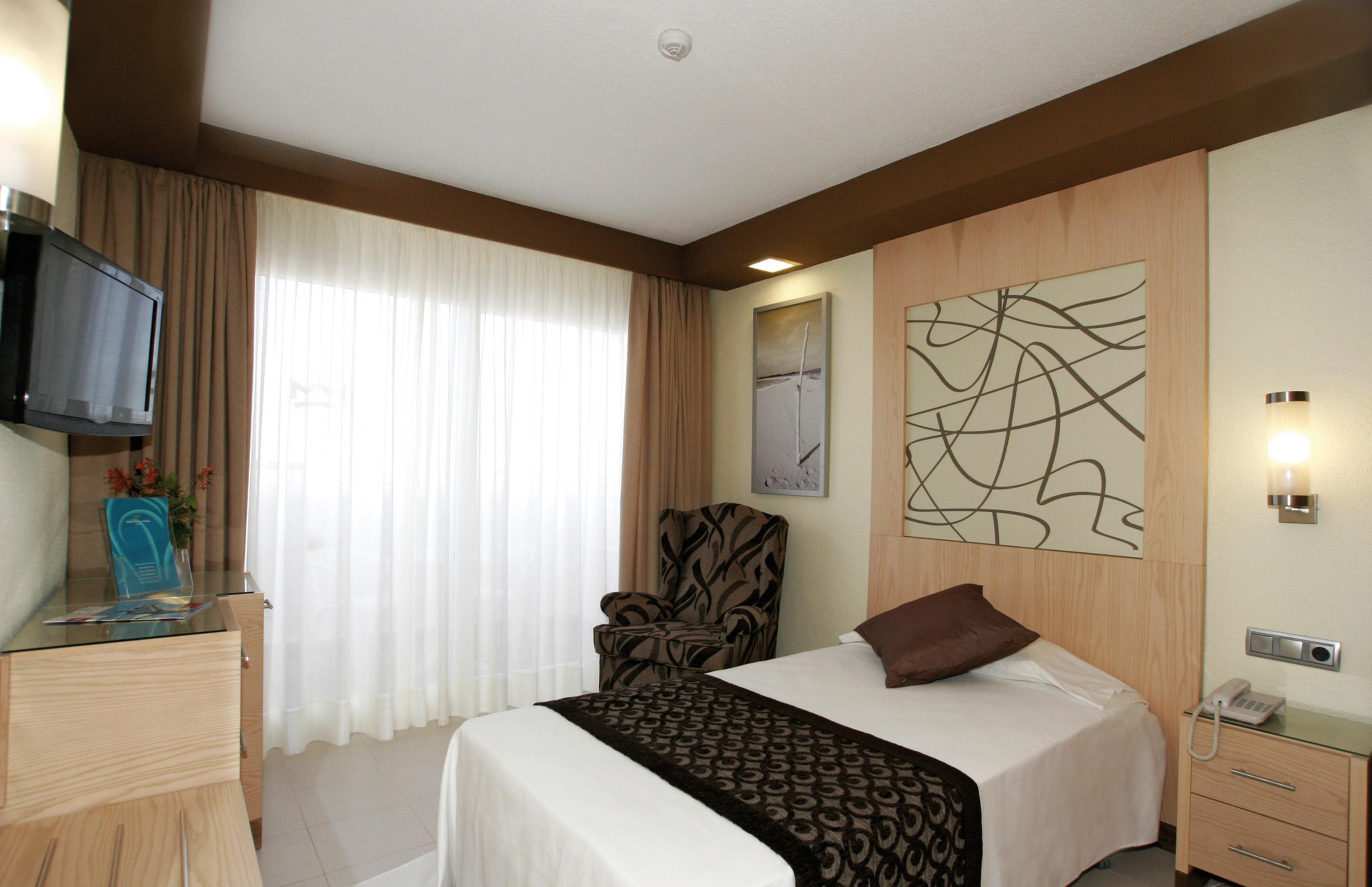 Riu La Mola Hotel Playa Migjorn Bagian luar foto